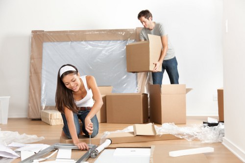 Loading furniture into a removal truck in Balham