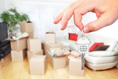 Moving team handling furniture during a van service