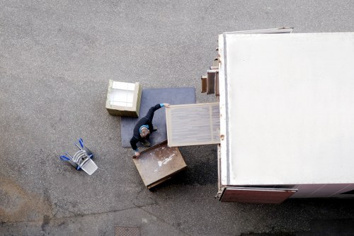 Man with van loading items for transport in South West London