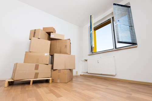 Packed boxes and household items ready for a removal service