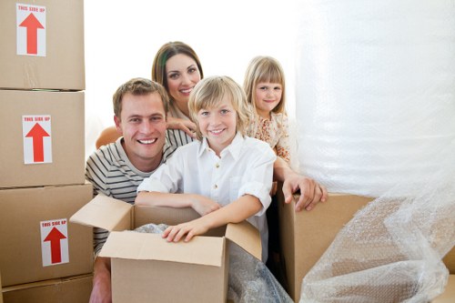 Unloading household items at a new Balham property during a local move