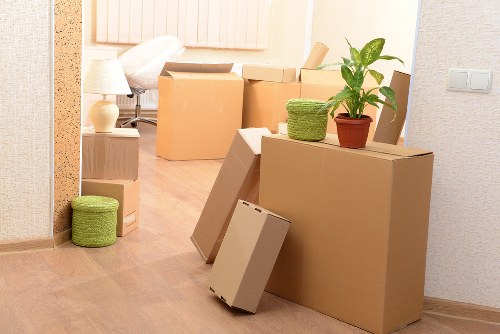 Local office moving team handling furniture near Balham